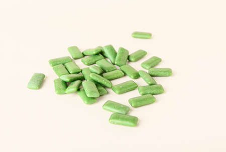 Tasty chewing gums on light background
