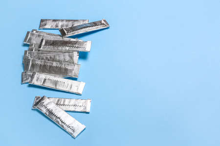 Tasty chewing gums on color backgroundの写真素材