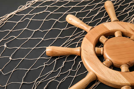 Helm and net on dark background