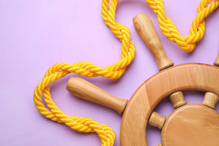 Helm and rope on color backgroundの写真素材