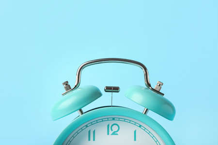 Alarm clock on color background, closeupの写真素材