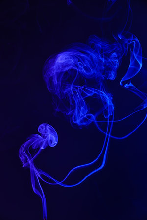 Color smoke on dark background