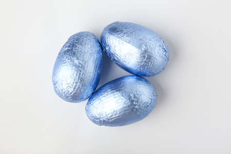 Sweet chocolate eggs on white backgroundの写真素材