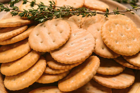 Tasty crackers as background, closeup