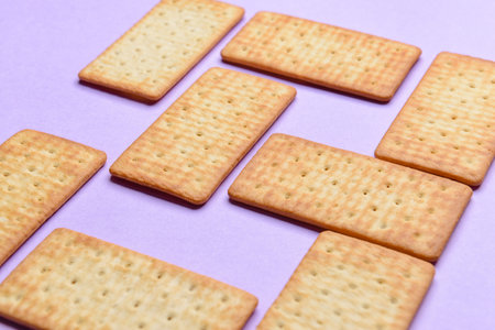 Composition with crackers on color backgroundの写真素材