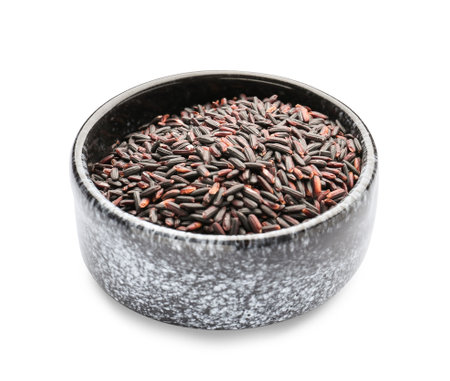 Bowl with black wild rice on white backgroundの写真素材
