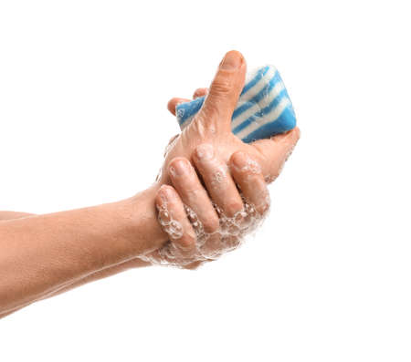 Man washing hands on white backgroundの写真素材