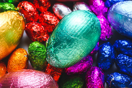 Many chocolate Easter eggs as background
