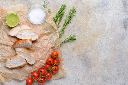 Tasty chicken fillet on light backgroundの写真素材