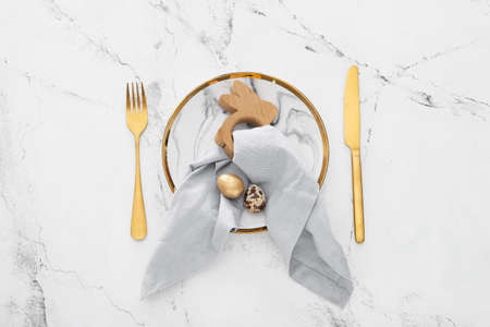 Beautiful table setting for Easter celebration on white background