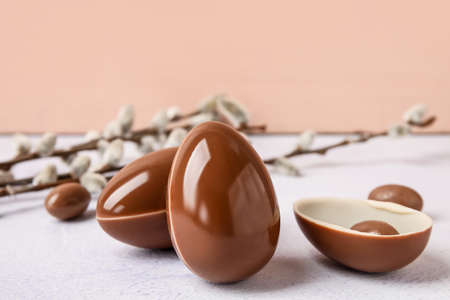 Sweet chocolate Easter eggs on table