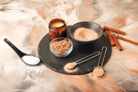 Bowl of natural scrub and ingredients on grunge backgroundの写真素材