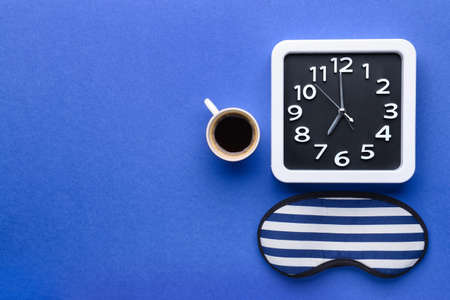 Composition with stylish clock on color background