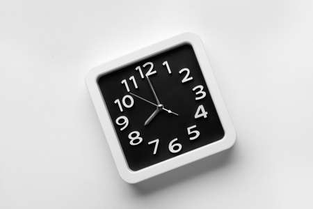 Stylish clock on light backgroundの写真素材