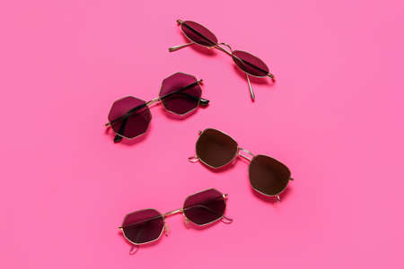 Stylish sunglasses on color backgroundの写真素材