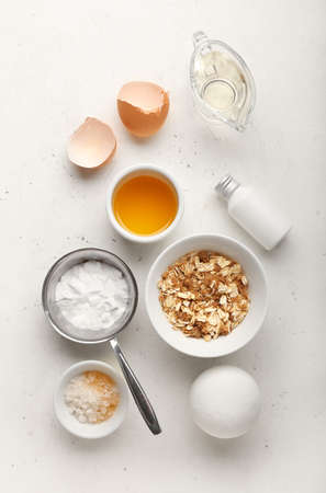 Different natural ingredients for homemade cosmetics on white background