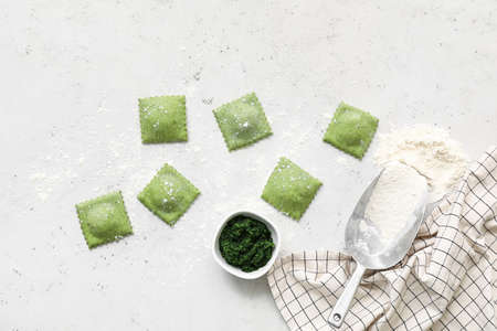 Raw ravioli on light backgroundの写真素材