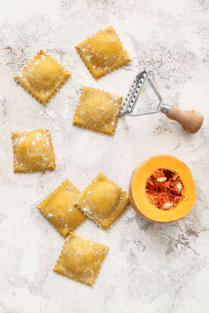 Raw ravioli on light backgroundの写真素材