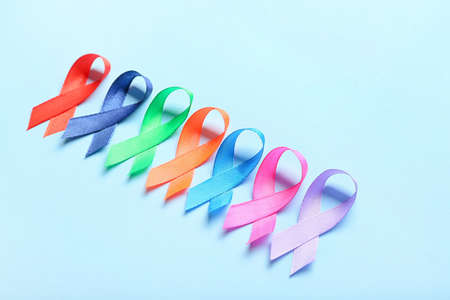 Different awareness ribbons on color backgroundの写真素材