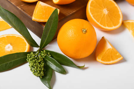 Fresh orange on white background, closeup