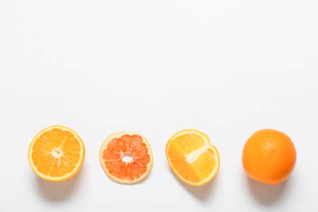 Tasty oranges on white background