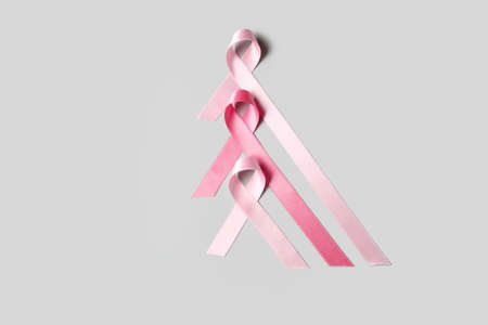 Pink ribbons on gray background. Breast cancer conceptの写真素材