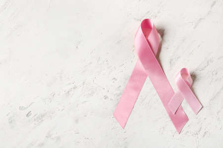 Pink ribbons on light background. Breast cancer conceptの写真素材