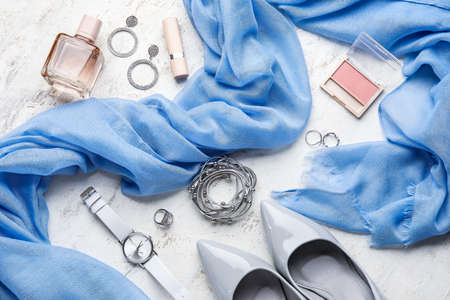 Set of female accessories and cosmetics on light backgroundの写真素材