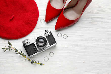 Set of female accessories on light wooden backgroundの写真素材