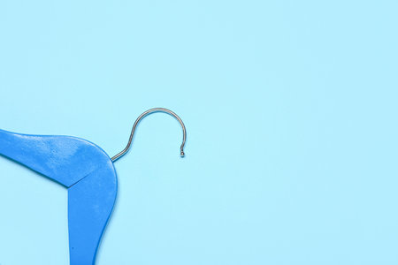 Stylish clothes hanger on color backgroundの写真素材