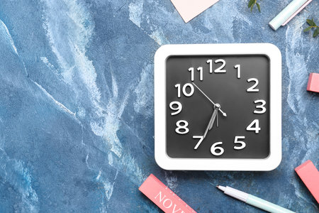 Composition with stylish clock on color backgroundの写真素材