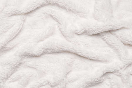 Texture of white fluffy fabric, closeup