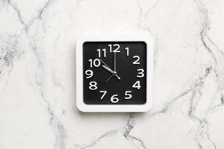 Stylish clock on light backgroundの写真素材
