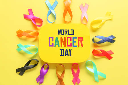 Awareness card for World Cancer Day with ribbons