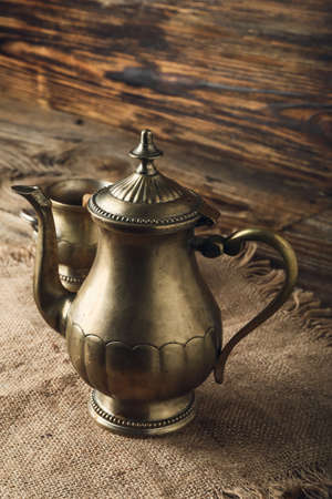 Arabic tea pot on wooden tableの写真素材