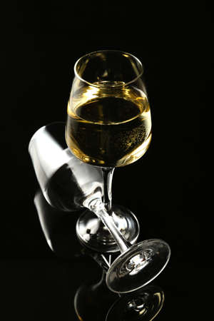 Glasses of wine on dark backgroundの写真素材