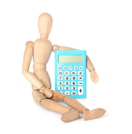 Wooden mannequin with calculator on white backgroundの写真素材