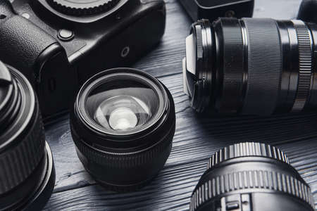 Modern photographer's equipment on dark background, closeupの写真素材