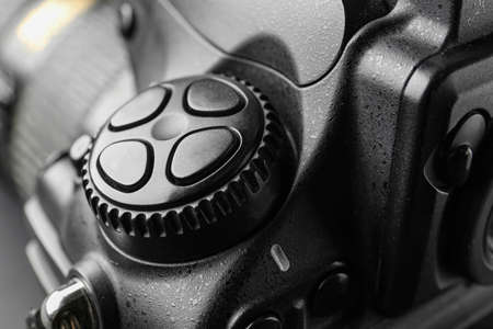 Modern professional photo camera, closeup