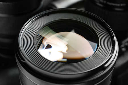 Camera lens on dark background, closeupの写真素材