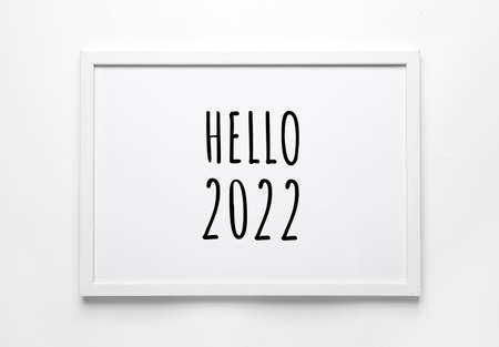 Photo frame with text HELLO 2022 on white background