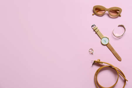 Stylish female accessories on color backgroundの写真素材