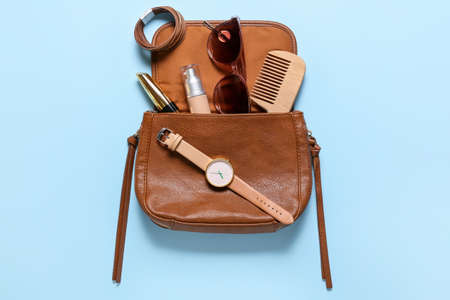 Stylish female accessories on color backgroundの写真素材