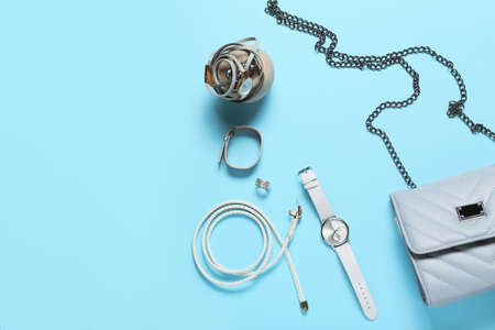 Stylish female accessories on color backgroundの写真素材