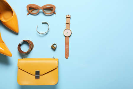 Stylish female accessories on color backgroundの写真素材