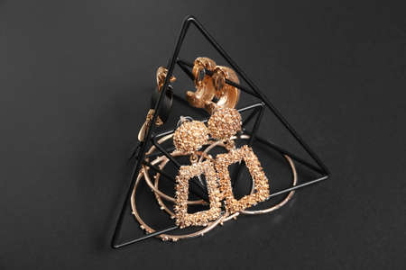 Composition with female jewelry on dark backgroundの写真素材