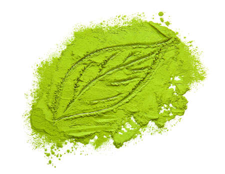 Leaf made of powdered matcha tea on white background