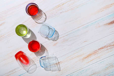 Beautiful glasses on light wooden backgroundの写真素材