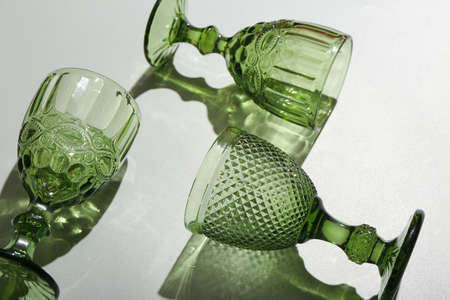 Beautiful empty glasses on gray background, closeupの写真素材