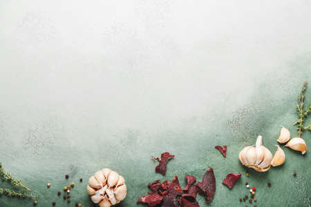 Spicy beef jerky on grunge backgroundの写真素材